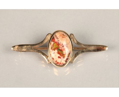 Ladies 9ct gold agate bar brooch, length 5.5cm Condition reportThe brooch is in good overall condition apart from some light 