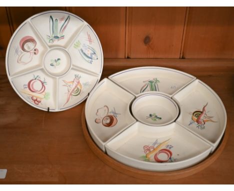 A Poole pottery five-piece hors d'oeuvres set, painted with vegetables, on wooden tray, 31 cm, to/w 22 cm one-piece hors d'oe