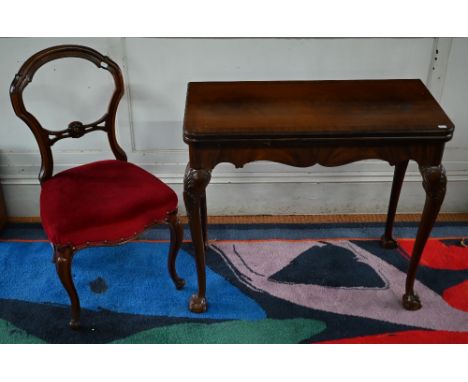 A reproduction mahogany folding card table on cabriole supports with ball and claw feet, 84 x 42 x 72 cm h to/w an antique Fr