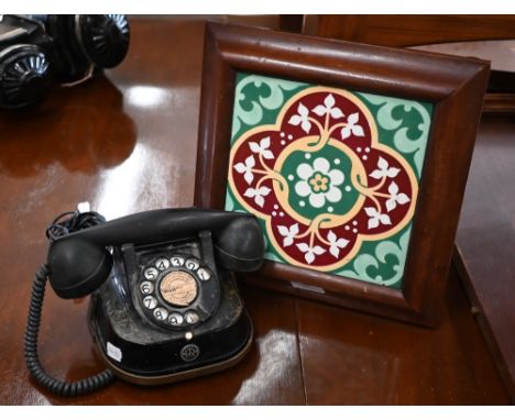 A vintage RTT (Belgium) Bell Telephone Mfg. Co telephone with brass carrying handle to/w a Minton Arts &amp; Crafts ceramic t