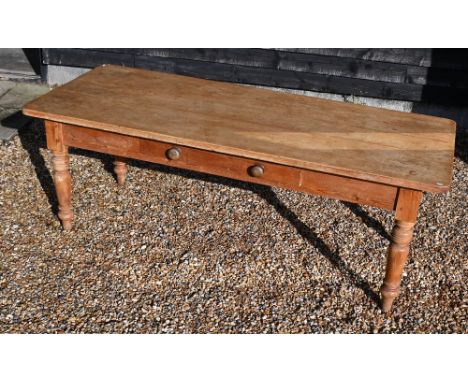 A vintage pine farmhouse dining table with single drawer and turned supports, 214 cm wide x 90 cm deep x 76 cm high 