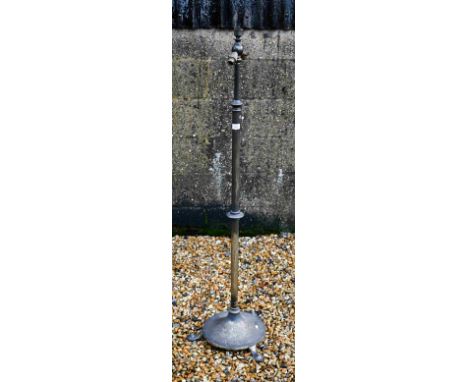 An adjustable brass standard lamp 