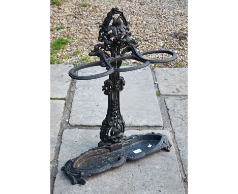 A Coalbrookdale style cast iron three-division stick stand, 72 cm high 