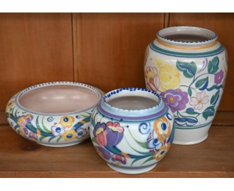Two Poole pottery floral-painted vases, 15cm and 9 cm, to/w a 15 cm bowl with similar decoration (3) 