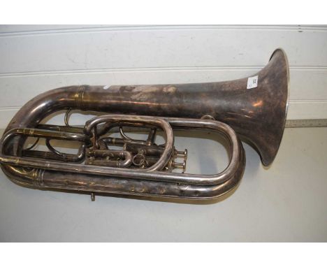A large silver plated Tuba marked the Dictor Excelsior Sonorous Class A Hawkes &amp; Sons