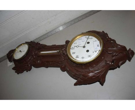 An unusual combination clock, barometer and thermometer in a cast iron frame