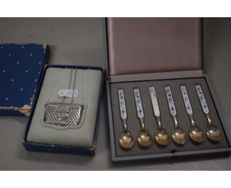 Cased set of enamel coffee spoons together with miniature Estee pendant formed as a handbag