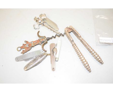 Mixed Lot: various folding pocket knives to include mother of pearl handled and silver bladed example, vintage nut crackers a