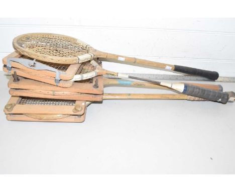 A mixed lot of 4 vintage rackets, to include: - Dunlop 'Blue Flash' in press - GR Adams and Co 'The Autocrat' in press - J&am