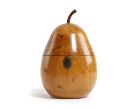 A treen fruitwood tea caddy in the form of a pear, with a stalk finial, the hinged lid revealing an interior with traces of f