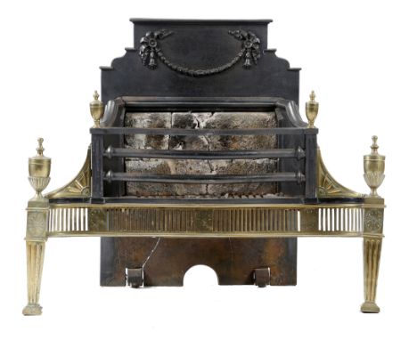 A large brass and cast iron fire-grate in George III style, the back decorated with ribbon tied husks, above a serpentine rai