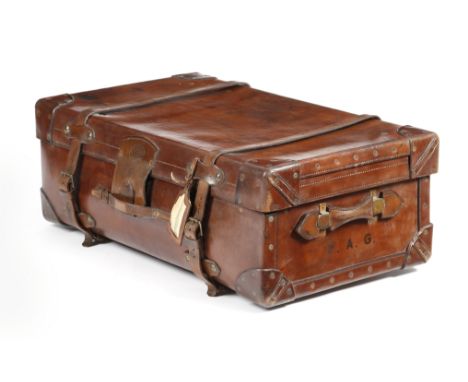 A Scottish brown leather cabin trunk by R. W. Forsyth, the canvas lined interior banded with crocodile edging, the lift-out t