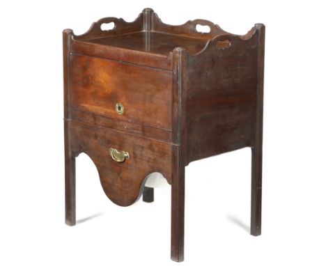 A George III mahogany tray-top bedside commode, the shaped gallery pierced with three handgrips, above a hinged retractable c