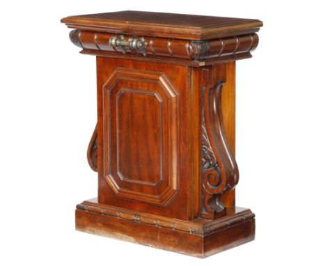 A William IV mahogany architectural pedestal cupboard, the top with a moulded edge above a leaf carved and baton frieze drawe