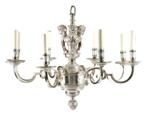 A pair of silvered brass eight-light 'Knole' chandeliers, the turned stem decorated with cherub masks and strap-work, with sc