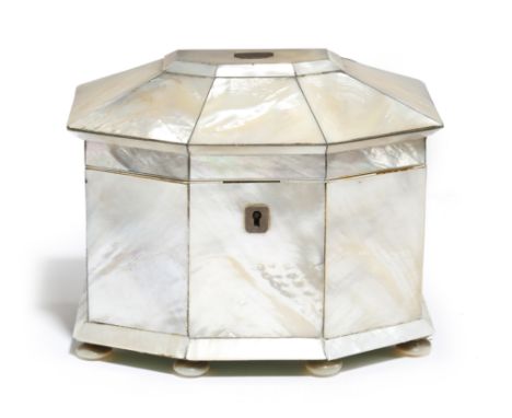 λ An early Victorian mother of pearl pagoda shape tea caddy, the hinged lid with a vacant plaque, revealing ivory edging and 