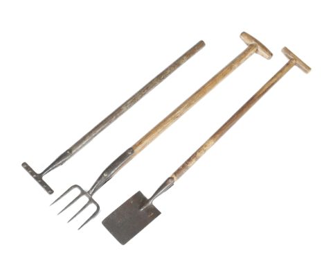 Three child's gardening tools, comprising: a rake with an ash handle, a fork and a shovel, 85cm long (max). (3)