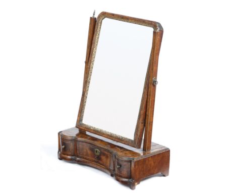 A George II walnut dressing table mirror, the later plate with a carved giltwood slip and a moulded frame, the box base with 