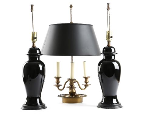 A French brass bouillotte table lamp, with three lights and a black tole shade, stamped '3020', 63.7cm high, together with a 