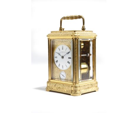 A small late 19th century gilt brass petite sonnerie carriage clock, the eight day movement with a platform lever escapement,