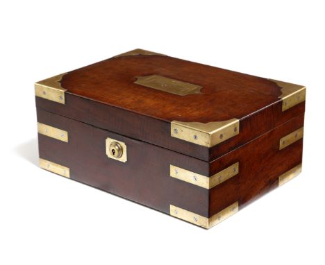 An early 19th century fiddleback mahogany and brass bound jewellery box, the hinged lid with a sunken brass handle, inscribed