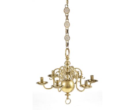 An 18th century style Dutch brass six-light chandelier, the ring top above a turned and ball stem, with dot numbered detachab