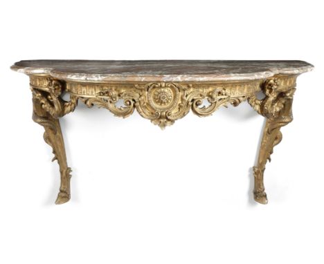 A 19th century French giltwood and composition console table, the shaped marble top with a moulded edge, the leaf and arcaded