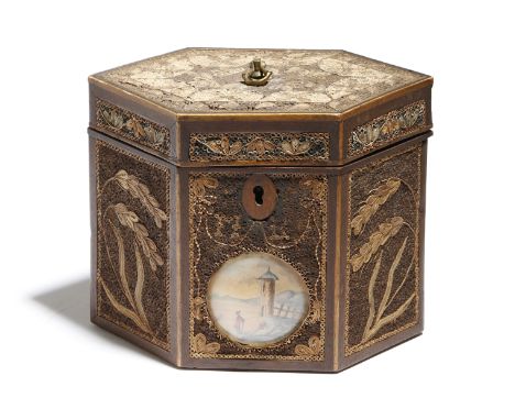 A George III rolled paper tea caddy, of canted form, with gilt highlights and decorated with panels of leaves and flowers, th