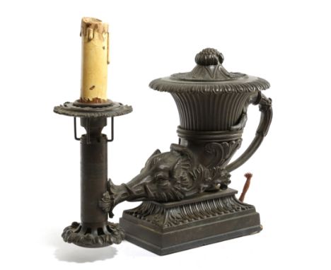 A Regency bronze argand lamp in the manner of Thomas Messenger, in the form of a classical lidded urn with a wild boar termin