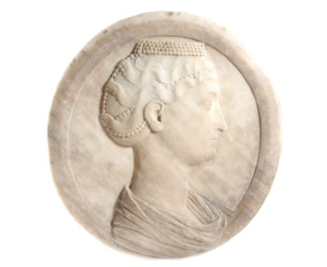 After the antique. An Italian marble portrait relief bust of Faustina the Elder, probably 19th century, 35cm diameter.