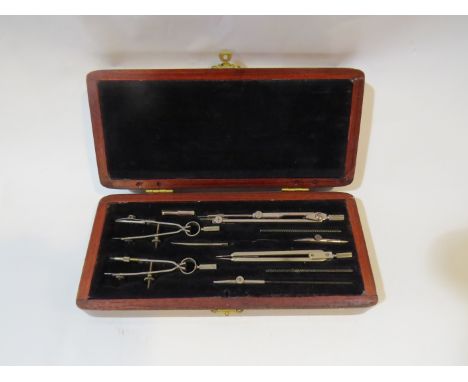 A hardwood cased geometry set with GDC personalisation to lid (from the studio of the renowned aviation artist, Gerald Coulso