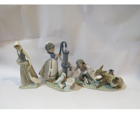 Two Lladro figural groups and one Nao example (3)