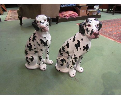 A pair of ceramic dalmatians, 49cm tall 