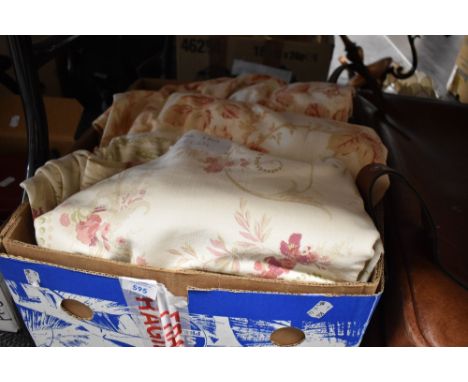 Two pairs of good quality floral curtains.