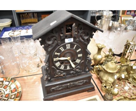 A Victorian cuckoo clock having a Black Forrest style gothic design
untested, pendulum included,pictures to follow.