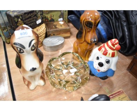 Three mid century dog figures and an art glass dish
