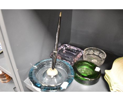 Four ash trays or trinket dishes including moulded, Art Deco pink cut and control bubble pen holder attributed to Brian Sling