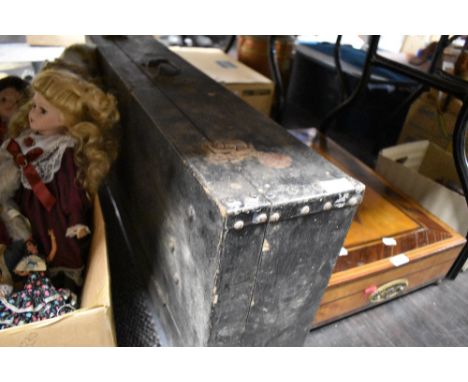 A vintage wooden tool chest and a selection of tools.