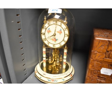 A glass domed anniversary clock by Kundo West Germany