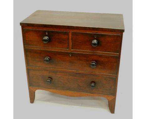 A 19thC mahogany chest of drawers, with a plain top above two short and two long drawers, each with turned wood handles, on b