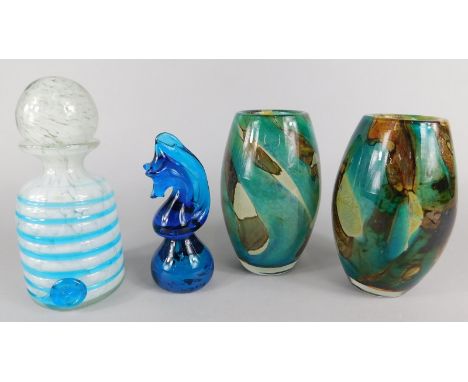 A pair of Mdina bullet shaped vases, a seahorse shaped paperweight and a small decanter and stopper