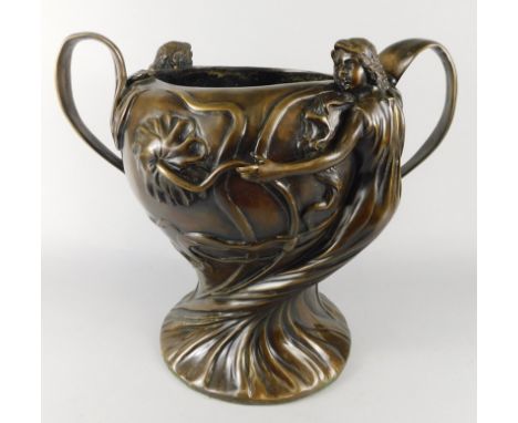 A large Art Nouveau style bronze two handled vessel, case with figures, leaves etc., 38cm high