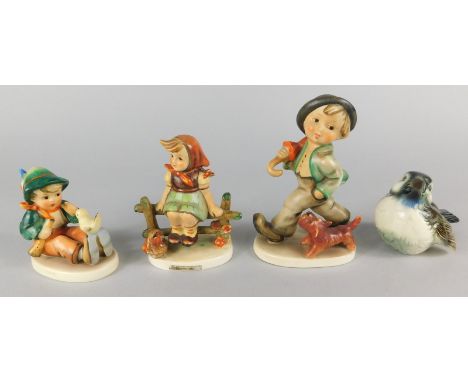 A collection of ceramics, to include three Hummel figures and a Goebel bird