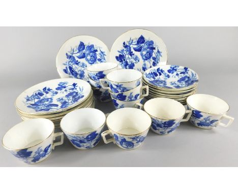 A 19thC porcelain part tea service, printed with deep blue flowers etc.