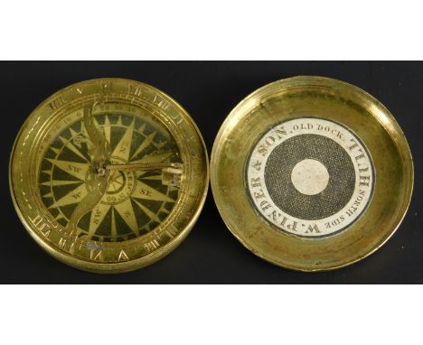A 19thC portable brass compass and sundial, stamped W Pinder & Sons, Old Dock, Northside, Hull, 5.5cm dia.