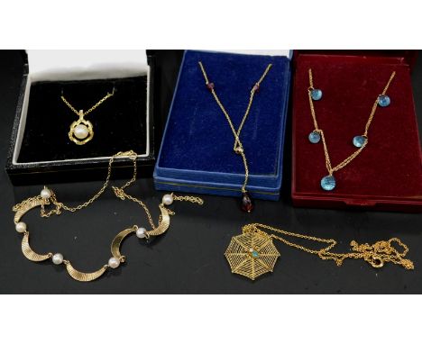 Five 9ct gold necklaces, to include a spider web, on fine link chain, two glass bead set necklaces, and two cultured pearl ne
