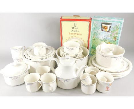 A Royal Doulton Nimbus pattern part dinner and tea service, a Royal Doulton Winnie the Pooh Collection three piece child's se