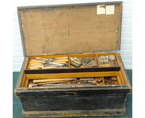 An ebonised pine cabinet maker's tool chest, containing a large number of tools, the chisel stamped Whittleston etc.