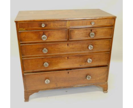 A 19thC mahogany chest of drawers, the top with a cushion type edge above an arrangement of two slender and two deeper short 