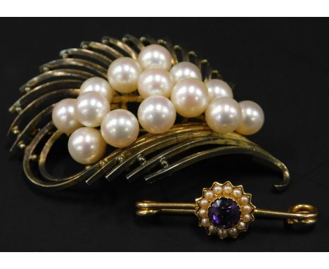 Two brooches, to include a fern spray brooch, set with pearls, marked Sterling, and a gold amethyst and seed pearl bar brooch